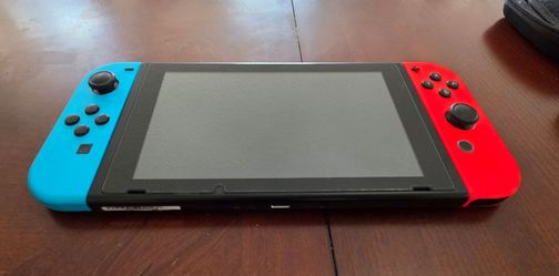 Nintendo Switch with Neon Blue and Red Joy-Cons