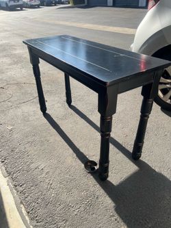 Black wooden table accent piece