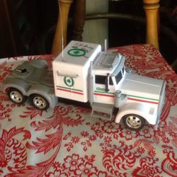 ORileys auto parts And A "HESS" collector remote control interactive battery operated toy.