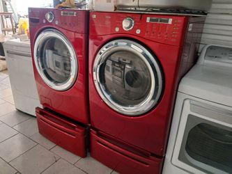 LG RED STEAM SMART FRONT LOAD WASHER AND GAS DRYER SET WITH PEDESTAL