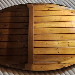 Antique frameless oval beveled C.D. Widman & Company wall mirror Detroit, Mich.