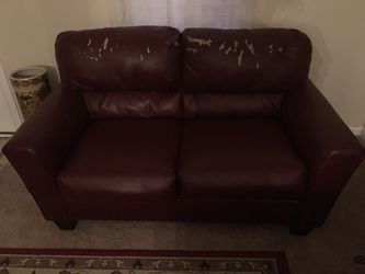 Loveseat.... peeled a little bit across the top... other than that in good condition.