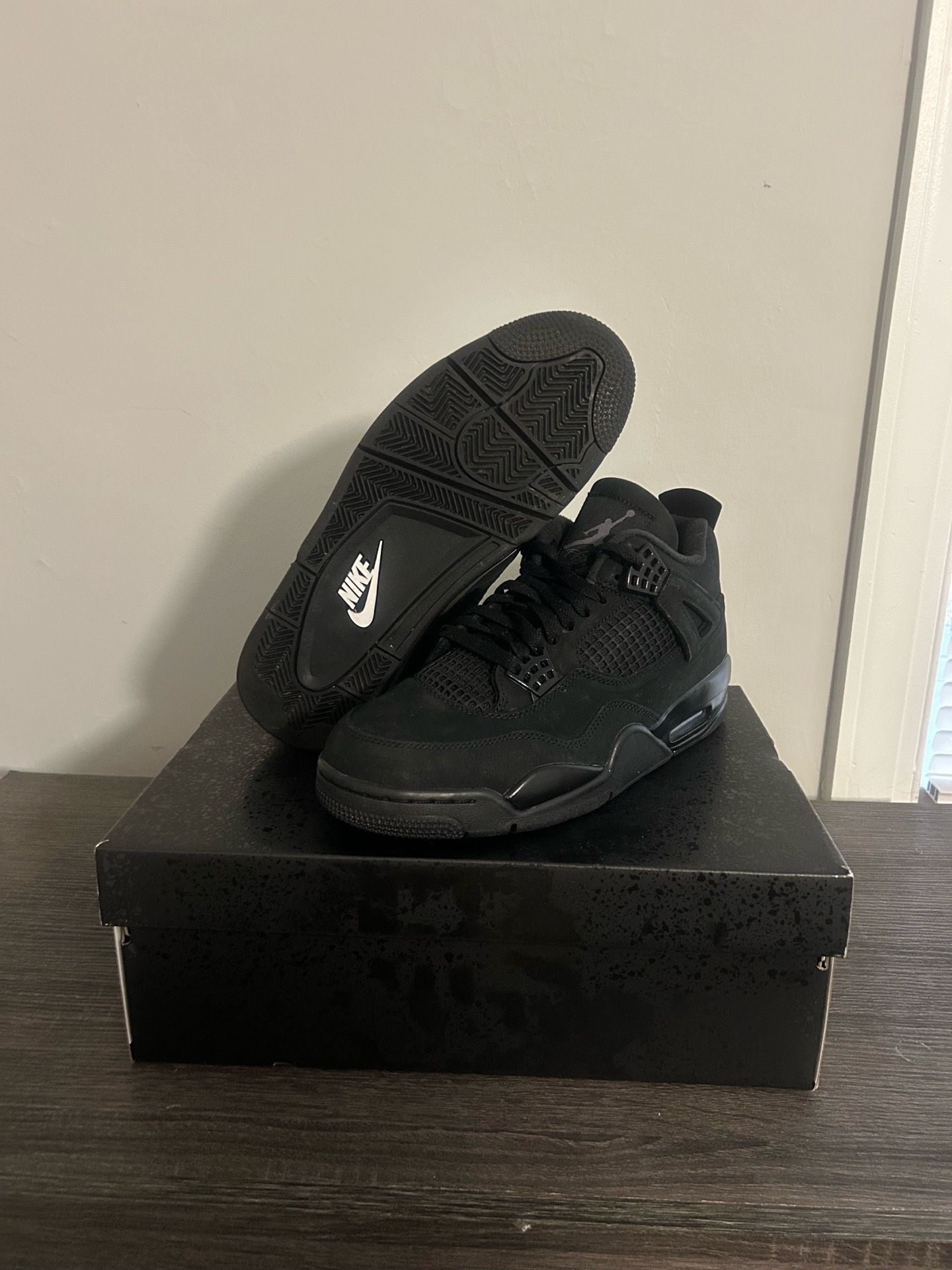 Air Jordan 4 Retro “Black Cat”
