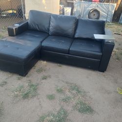 black faux-leather sectional sofa