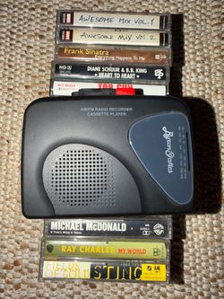 Cassette Player + 15 Cassette Tapes
