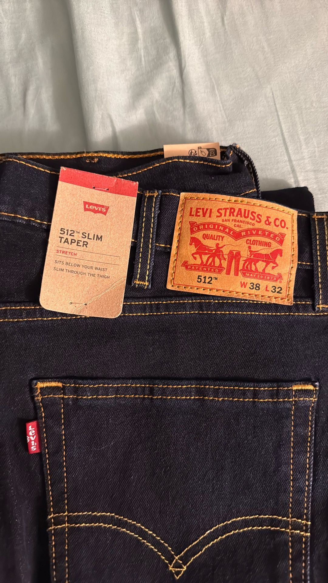 3 Levi’s Navy 512 Slim Taper $50 each