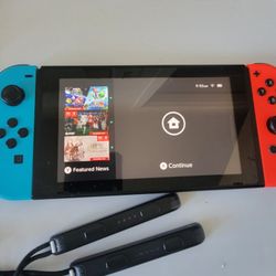 Nintendo Switch W/ Zelda Breathe Of The Wild