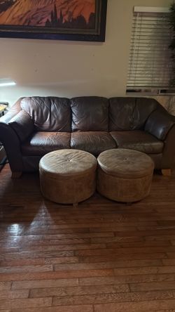 Leather dark brown couch with 2 leather round footrests