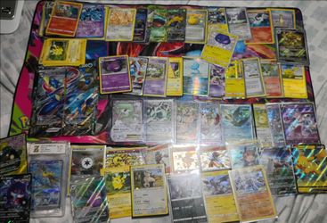 $1100 in value take all $850 below %80  Pokemon cards collection