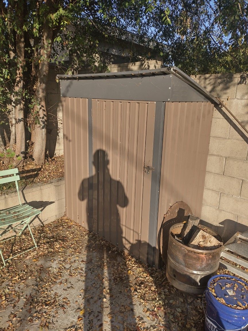 Metal Shed 34" X 59"