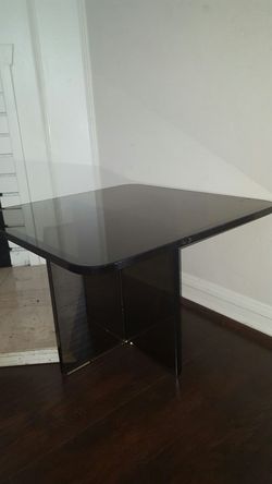 2 side all glass end tables.