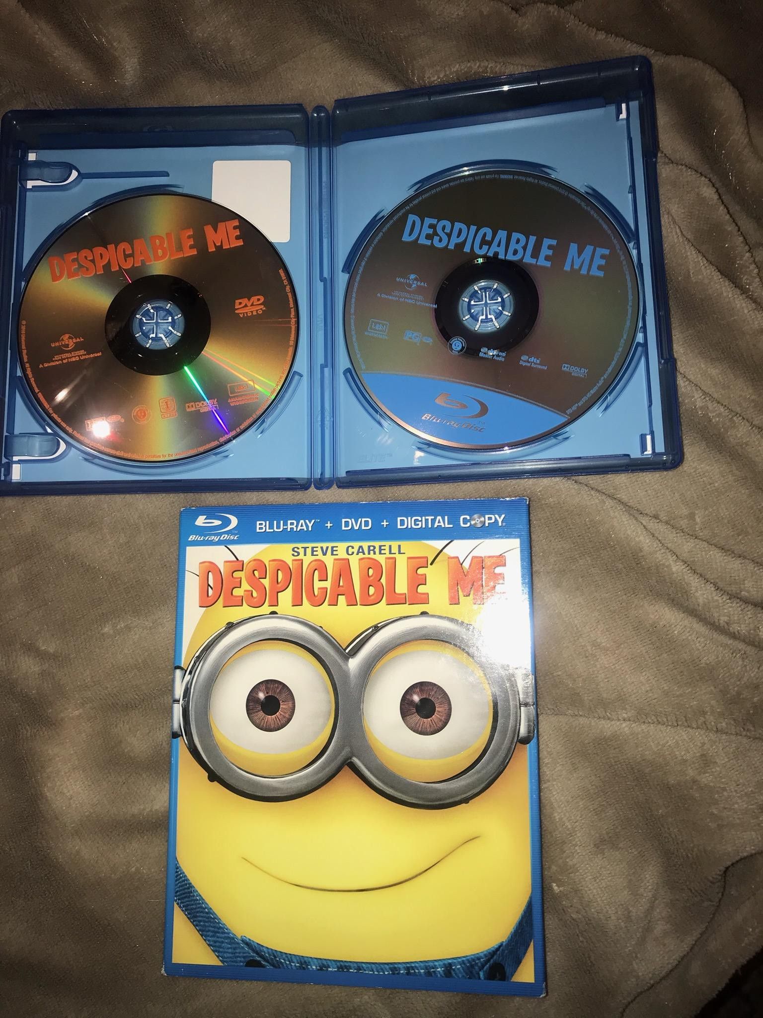Despicable me minions movie includes both the DVD and Blu-ray) plus slip cover . Great used condition. Works perfect . J