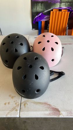 Three kids size retrospec helmets