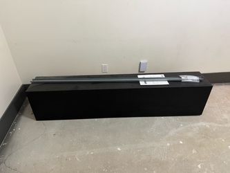 Wall cabinet with glass shelf