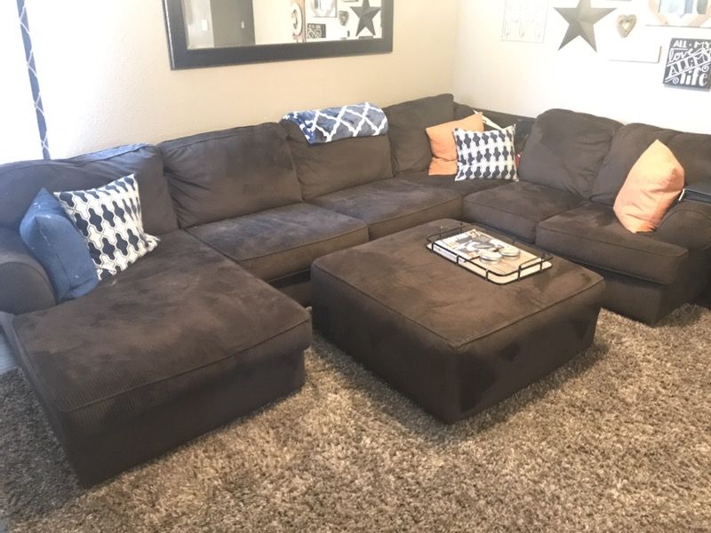 Brown sectional with ottoman