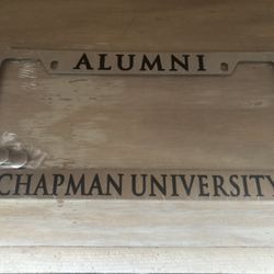 New CHAPMAN UNIVERSITY Alumni License Plate Frame Silver metal.