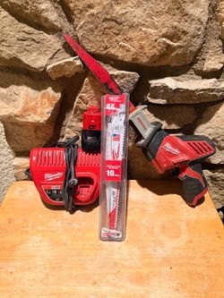Milwaukee hacksaw w/ battery, charger & blades