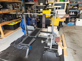 Weight bench, weights and Olympic bar