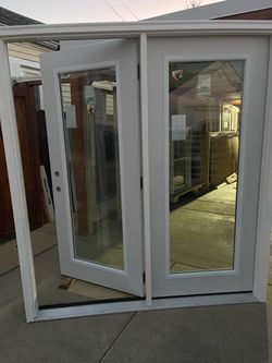 New double doors stel low.e glass have size w71.1/2 h79.1/2 only 1 door open Inswing frame Compasite molding to $650