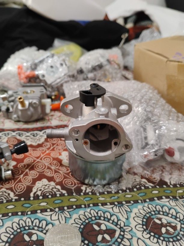a carburetor and other parts for a Stihl power tool. 
The product is a carburetor kit for various Stihl models, such as the BG56, SH56, SH86, FS87, F