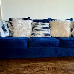 2 Couches, Ottoman, And Rug Bundle