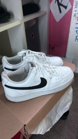 black and white woman’s nike