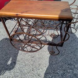 Elegant Vintage wrought iron wine cart , perfect for home decor.  Unique!