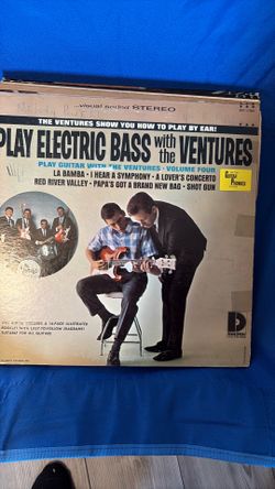 Learn to play guitar with the Ventures sand others. $25 each.