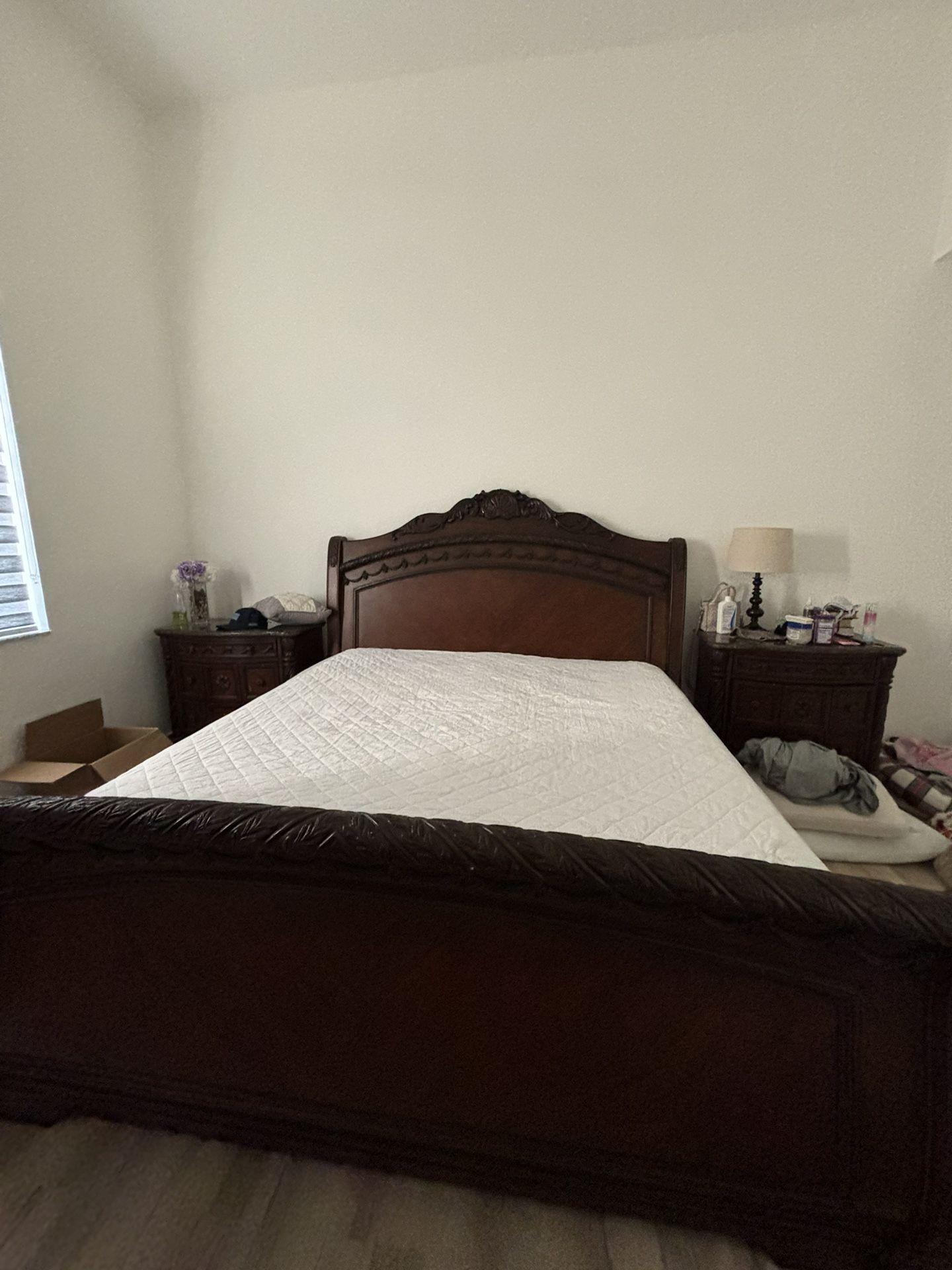 bed set with mattress and two bedside tables 