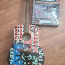 A Fender Kozik Punk Age Acoustic Guitar, Package of strings and a NEW Complete GUITAR set includes a128-page Book, 2 DVDs and a Guitar Stand 