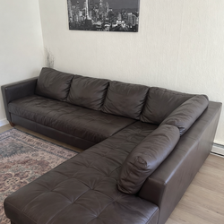 Large brown leather sectional couch