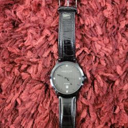 kenneth cole men watch with brand new battery. (MUST SELL TODAY!)