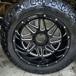 20x10 , -19 offset Hostile wheels with fresh 37 inch ridge grappler tires 