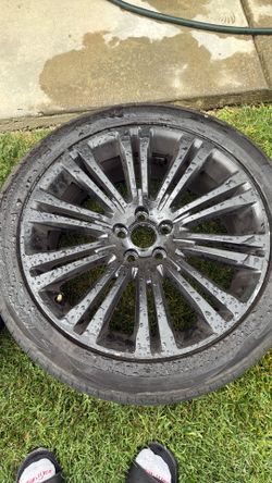 Set of 4 black 20-inch wheels with WESTLAKE tires.