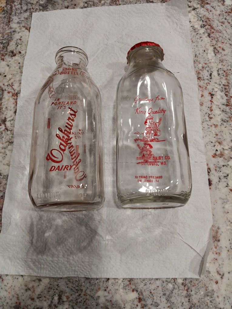 Pair Of Antique Glass Milk Bottles