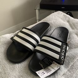 New. Adidas….. $25  Size 11