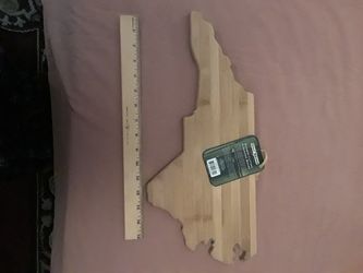 Bamboo cutting board, NC shape.
