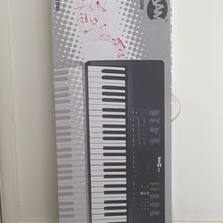 RockJam Compact 61 Key Keyboard with Sheet Music Stand, Power Supply, Piano Note Stickers & Simply P
