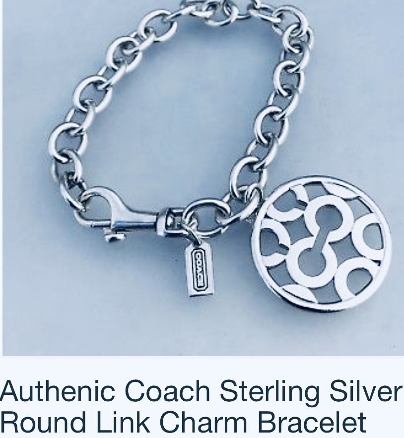 Authentic COACH sterling silver circular charm link bracelet