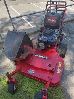 Toro lawn mower stand behind