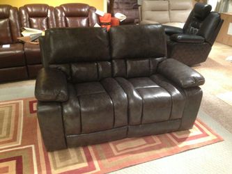 100%leather reclining loveseat