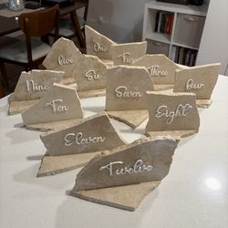 Travertine stone table numbers & bar sign