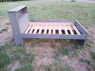 Twin sized bed double bottom pull out bed