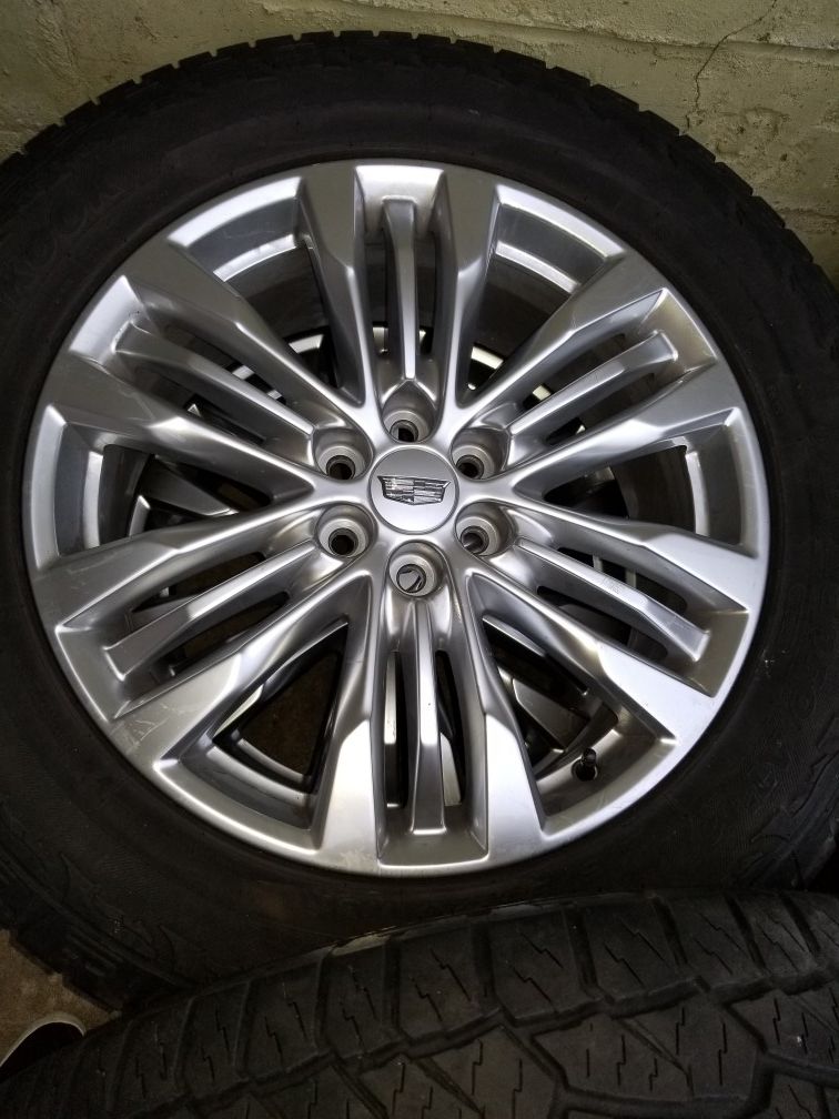 Cadillac set of 4 wheels.