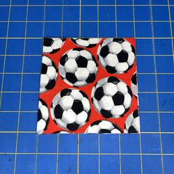 Flannel Fabric 5” Rotary Cut Squares -56 Squares, Soccer  This lot of Jo-Ann flannel fabric comes in a red color with a soccer pattern. The 5'' square