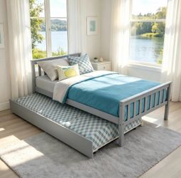 Twin size bed w/ trundle and 2 mattresses