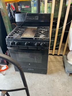 Black gas GE stove