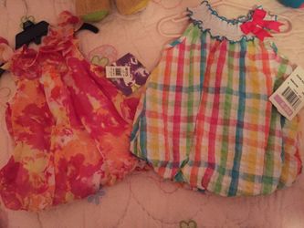 Baby girl 6-9 & 12 mos dresses. Brand new. $17. both.