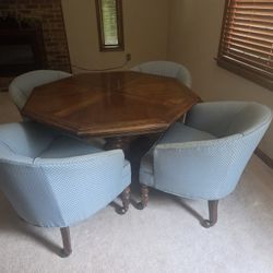 Table and 4 light blue chairs 