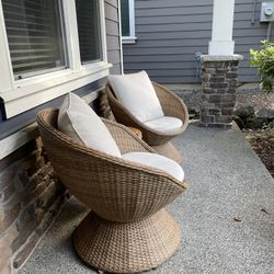 Wicker Outdoor Set With Two Swivel Chairs and a Table